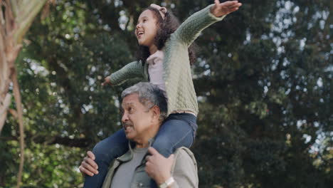 Fun,-playful-grandfather-carrying-child