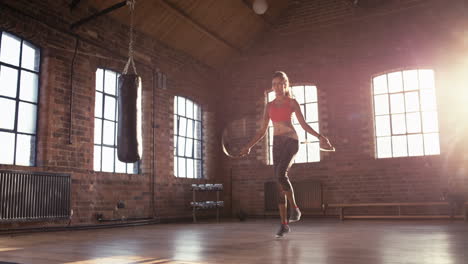 Young-woman-skipping-at-the-gym