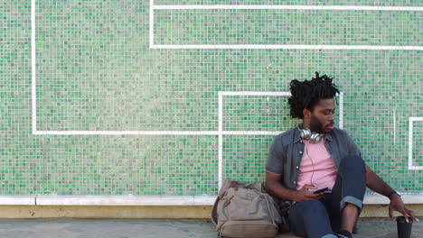 A-young-trendy-black-male-student-with-dreadlocks