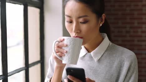 Morning-coffee,-phone-and-Asian-business-woman