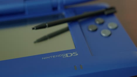 Extreme-Close-Up-Pan-Right-of-a-Nintendo-DS-and-Stylus