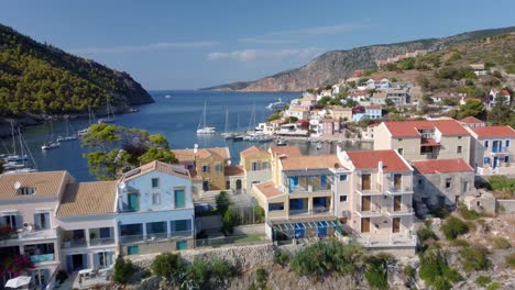 Town-of-Assos-with-colorful-houses-on-the-mediterranean-sea,-Greece