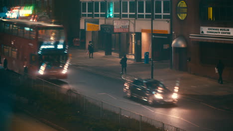 Time-lapse-of-traffic-and-cars-driving-at-night-on-a-busy-London-road