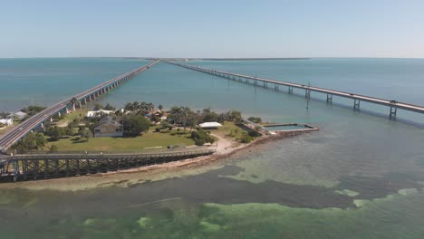 seven-mile-bridge-florida-keys-pigeon-old-new-tropical-vacation-destination-blue-water-gulf-of-mexico-tourism-aerial-drone-trucking