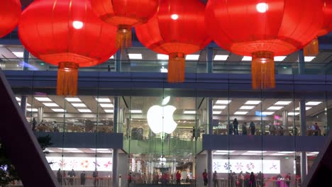 Red-lanterns-for-the-Chinese-Lunar-New-Year-hang-from-a-pedestrian-bridge-as-the-American-multinational-technology-company-Apple-official-store-is-seen-in-the-background-in-Hong-Kong
