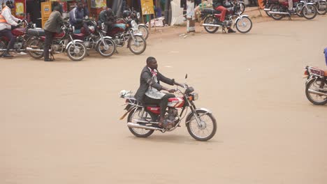 Typical-old-African-motorcycle-going-down-the-street