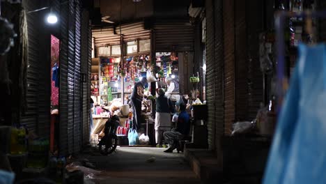 Night-Time-View-Looking-Down-Alley-At-Open-Shop-At-Saddar-Bazar-In-Karachi
