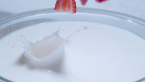 Strawberries-and-cream-in-super-slow-motion-profile-view