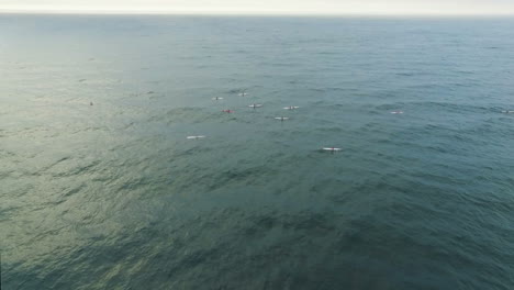 Aerial-drone-footage-of-people-in-canoes-rowing