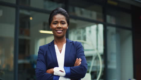 Face,-business-and-black-woman-with-arms-crossed