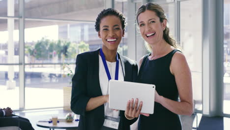 Teamwork,-digital-tablet-and-business-women