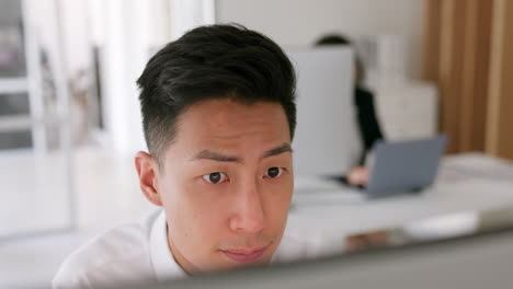 Asian-businessman,-thinking-face