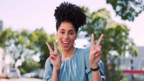 Black-woman-with-face-and-peace-hand-sign