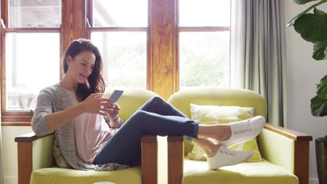an-attractive-young-woman-using-a-smartphone