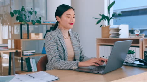 Laptop,-typing-and-asian-business-woman-in-office