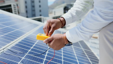 Technician,-hands-and-multimeter-testing-solar