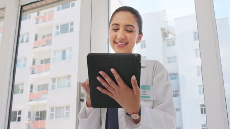 Digital-tablet,-research-and-woman-doctor