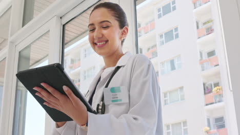 Tablet,-hospital-and-happy-woman-doctor