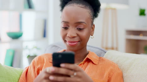 Cellphone,-communication-and-black-woman-on-a-sofa