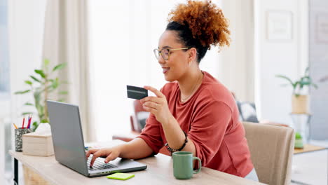 Laptop,-credit-card-and-black-woman-typing