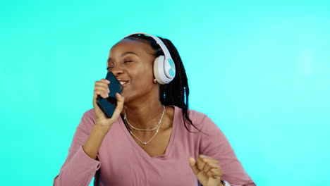 Sing,-dance-and-black-woman-with-headphones-music