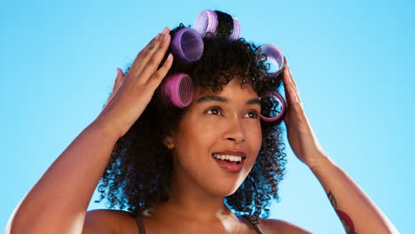 Afro,-smile-and-black-woman-with-roller-for-hair