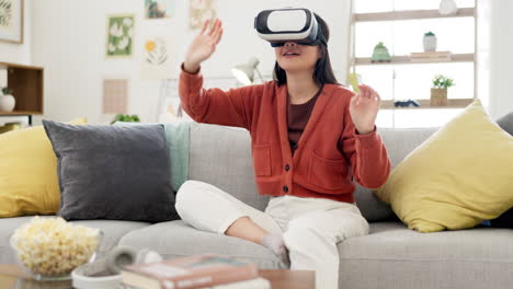 VR,-gaming-goggles-and-woman-on-couch