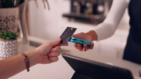Pos,-hands-of-woman-and-payment-with-credit-card