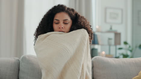 Cold,-winter-and-woman-with-blanket-on-sofa