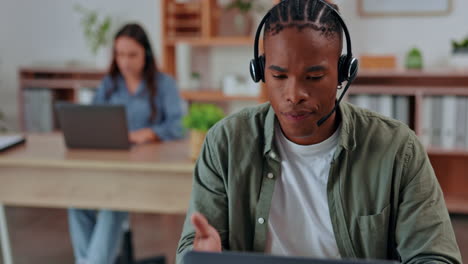 Black-man,-call-center-and-laptop-with-headset