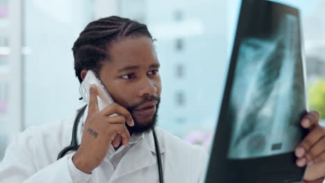 Male-doctor,-xray-and-phone-call-for-talk