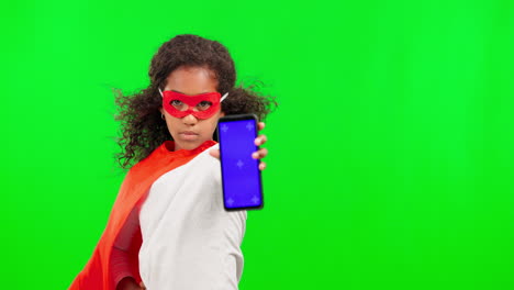 Girl-child,-superhero-and-phone-by-green-screen