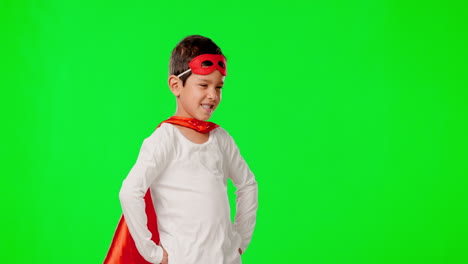 Child,-hero-costume-and-green-screen-studio