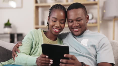 Digital-tablet,-love-and-happy-couple-on-a-sofa