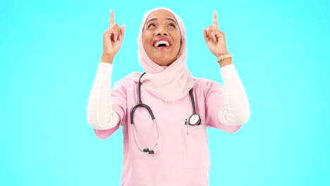 Muslim-nurse,-happy-woman-and-pointing-finger