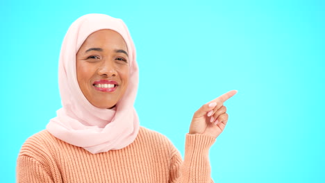 Muslim-woman,-happy-and-portrait-pointing-finger