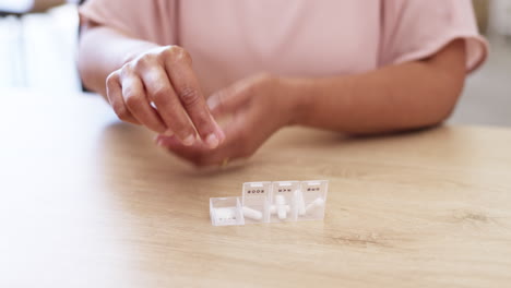 Woman,-pills-and-hands-in-healthcare