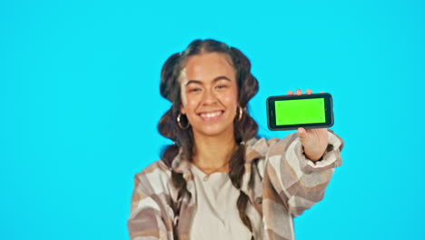 Woman,-green-screen-and-phone-in-studio