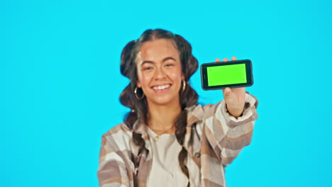 Phone,-green-screen-and-happy-woman-in-studio