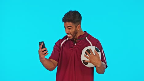 Man,-soccer-ball-and-phone-with-winner-celebration
