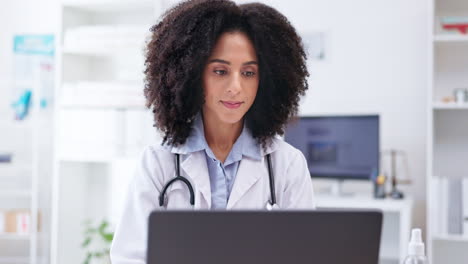 Happy,-woman-and-medical-doctor-at-laptop
