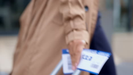 Closeup,-hand-and-woman-with-a-ticket