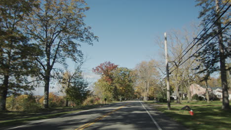 Drive-through-a-typical-American-suburb-on-a-clear-autumn-day