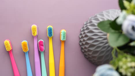 Ful-toothbrushes-on-purple--background