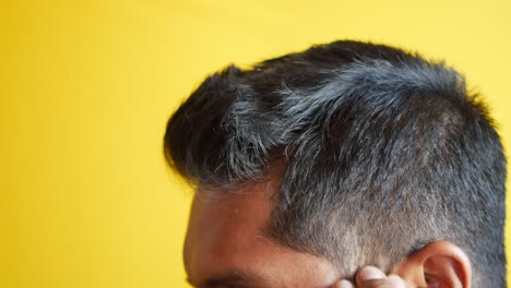 Hair-loss-concept-with-man-checking-his-hair
