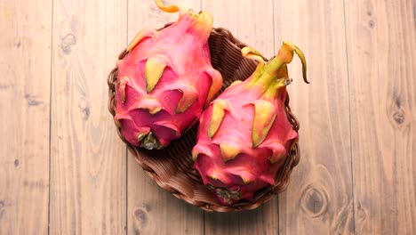 Slice-of-dragon-fruit-on-a-chopping-board,