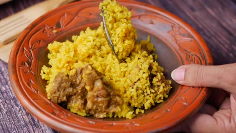 Boiled-yellow-rice-with-meats-on-a-plate
