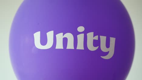 Unity-text-on-a-purple--ballon
