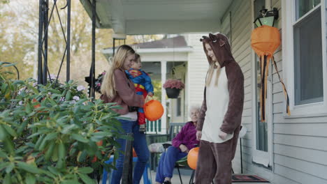 Wilson,-NY,-USA,-October-2021:-Children-in-festive-costumes-go-for-candy-on-Halloween-day