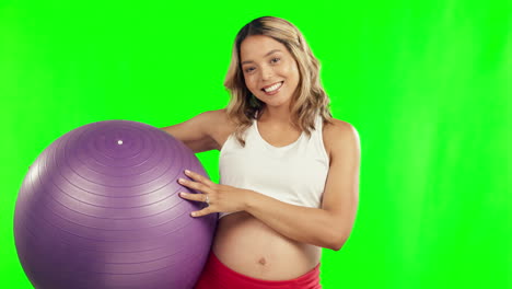 Strong,-exercise-ball-and-pregnant-woman-on-green
